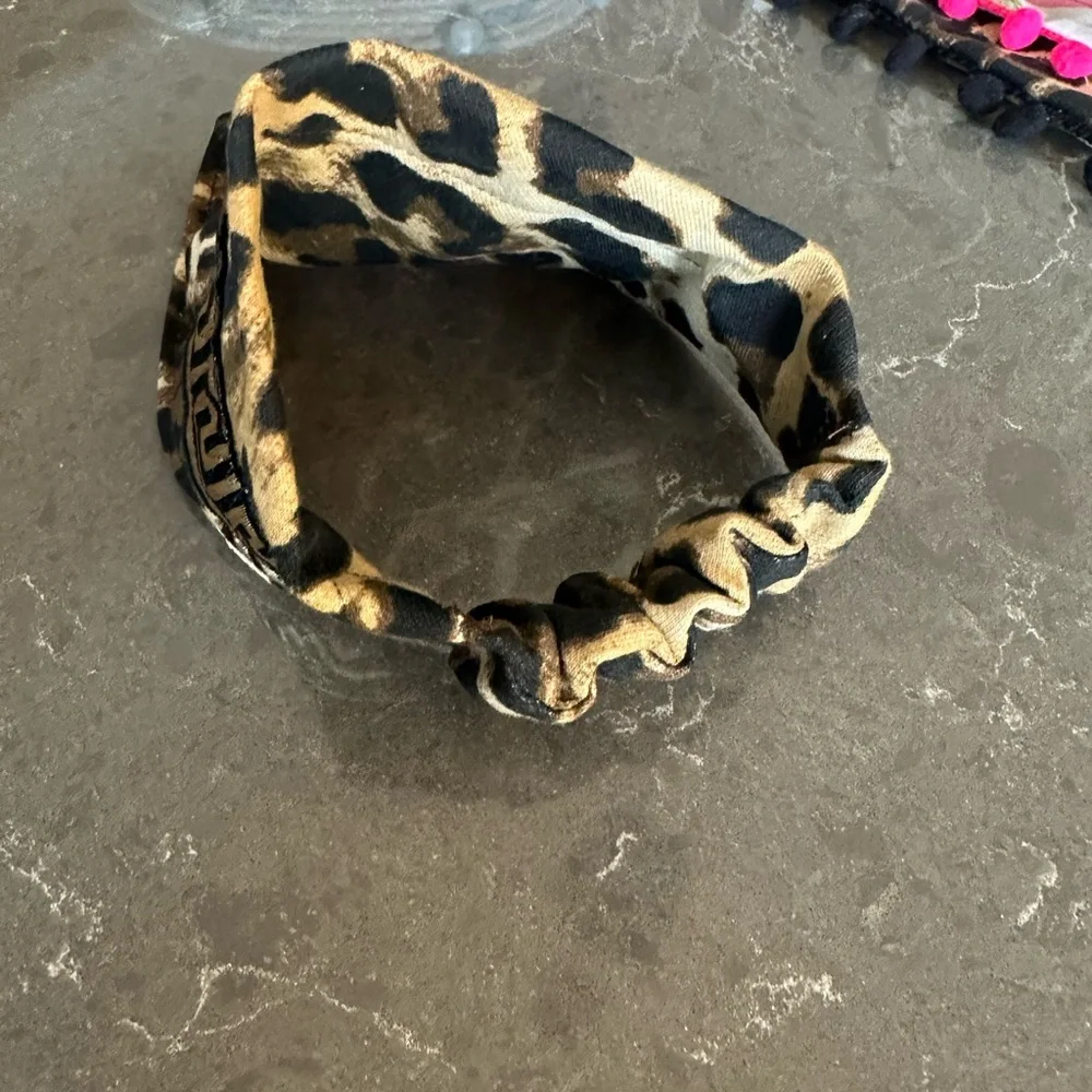 Handcrafted dog bandanna in Sm. Measures 13 to 15 inches around.